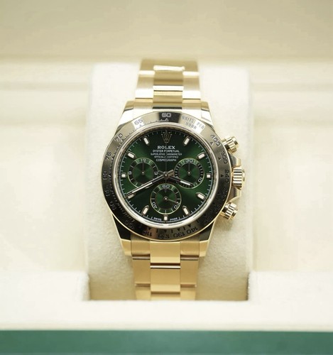 Rolex daytona gold green - gold,